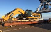 CF&S Transport CAT and Komatsu Machines by Rail