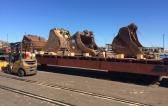 CF&S Transport CAT and Komatsu Machines by Rail