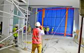 MIS Perform Lifting & Installation of Large Glass Panel