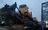 Goodrich with Transportation of Liebherr Excavator & Bulldozers