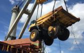 Nonpareil International Handle Challenging Export Shipment of Six Dump Trucks