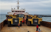 Nonpareil International Handle Challenging Export Shipment of Six Dump Trucks