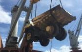 Nonpareil International Handle Challenging Export Shipment of Six Dump Trucks