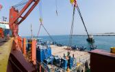 Sealand Shipping Triumph with Seamless Barge Load