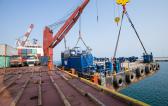 Sealand Shipping Triumph with Seamless Barge Load