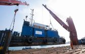 Sealand Shipping Triumph with Seamless Barge Load