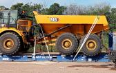Afriguide Logistics Ship CAT Trucks from Durban to Madagascar