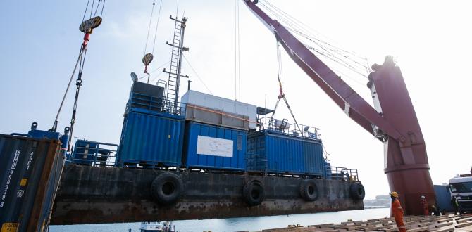 Sealand Shipping Triumph with Seamless Barge Load