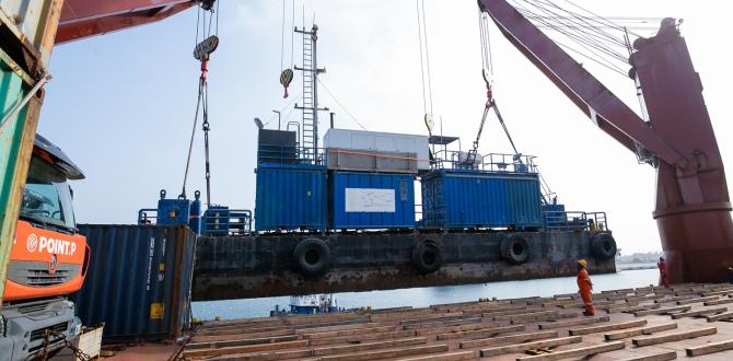 Sealand Shipping Triumph with Seamless Barge Load